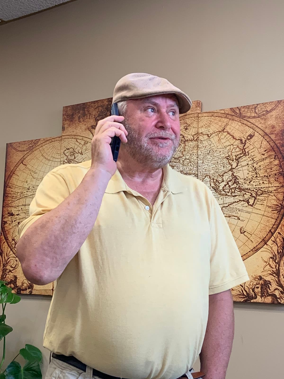 TJ Thorlackson on the phone with a client